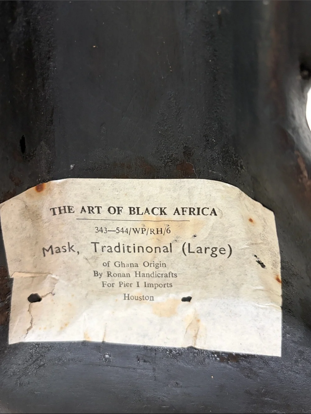 Hand-Carved Black and Brass Tribal Mask from Ghana